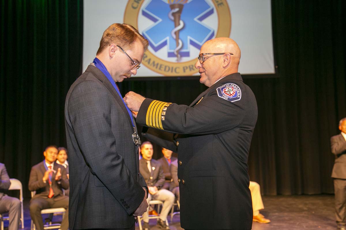 CHC Paramedic Grad with father.