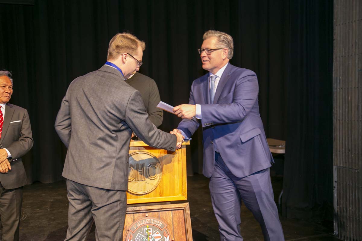CHC Paramedic Grad with father.