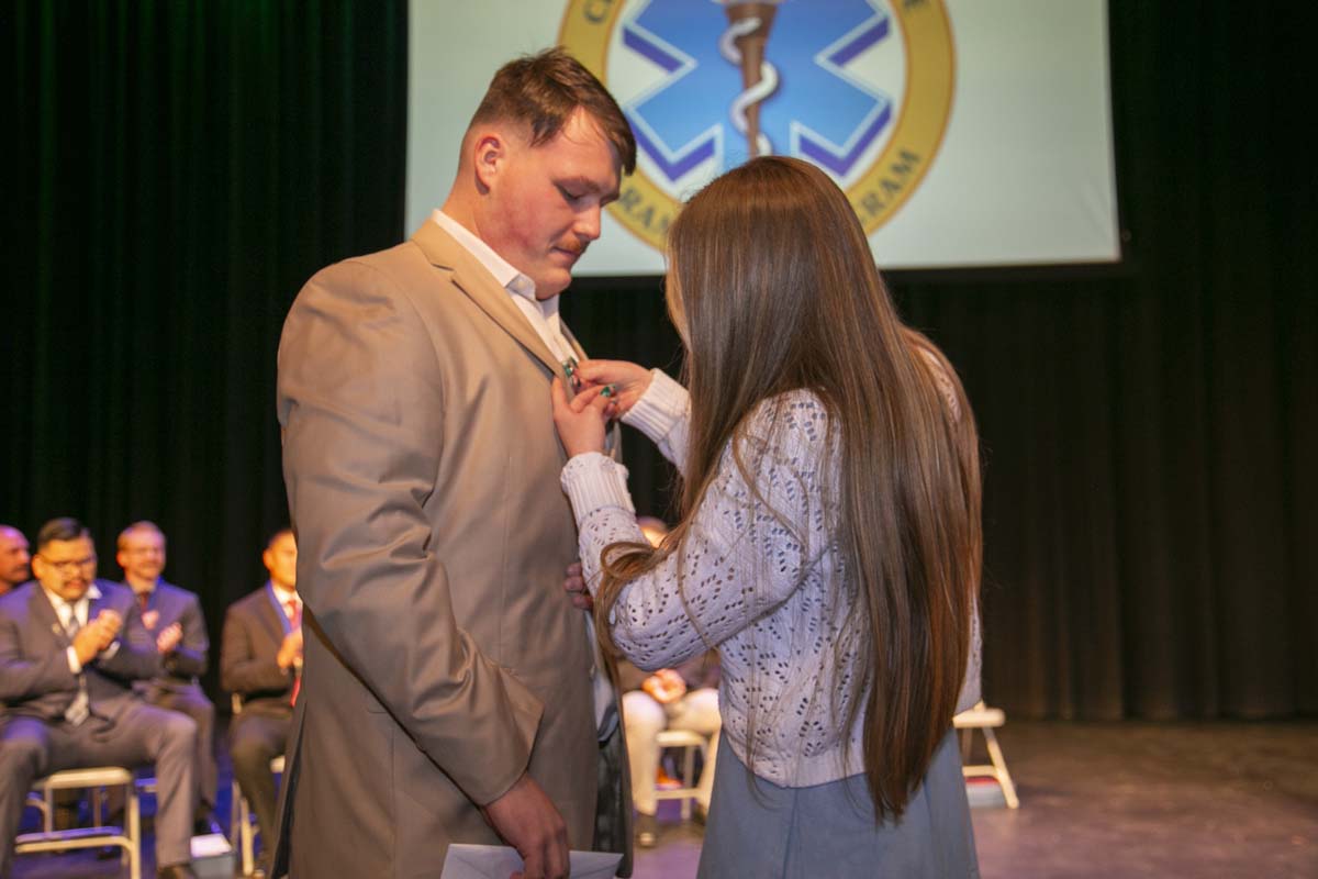 CHC Paramedic Grad with father.