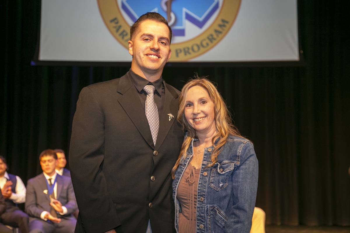 CHC Paramedic Grad with father.