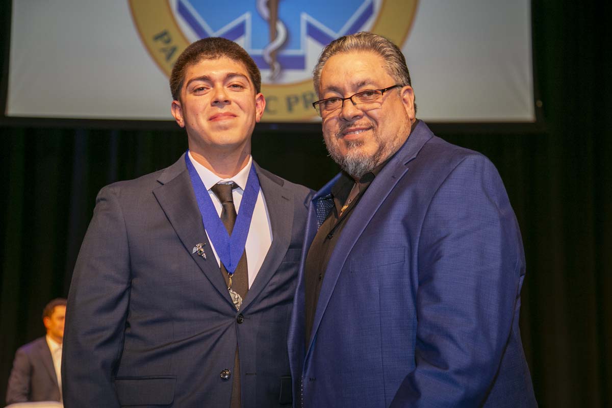 CHC Paramedic Grad with father.