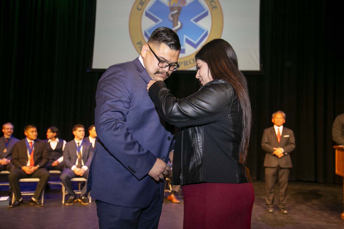CHC Paramedic Grad with father.