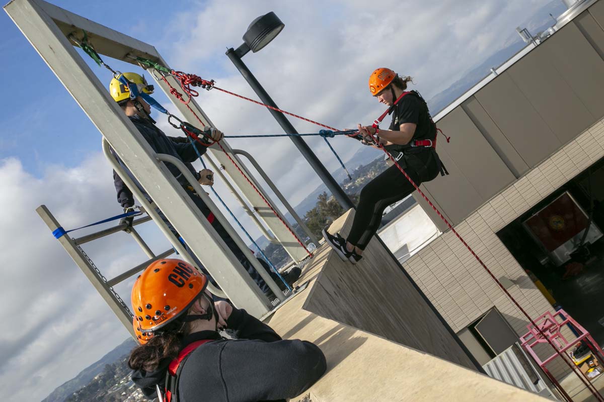 Girls attend the Empowerment Camp at Fire Academy.