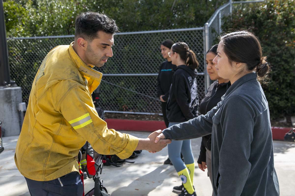 Girls attend the Empowerment Camp at Fire Academy.
