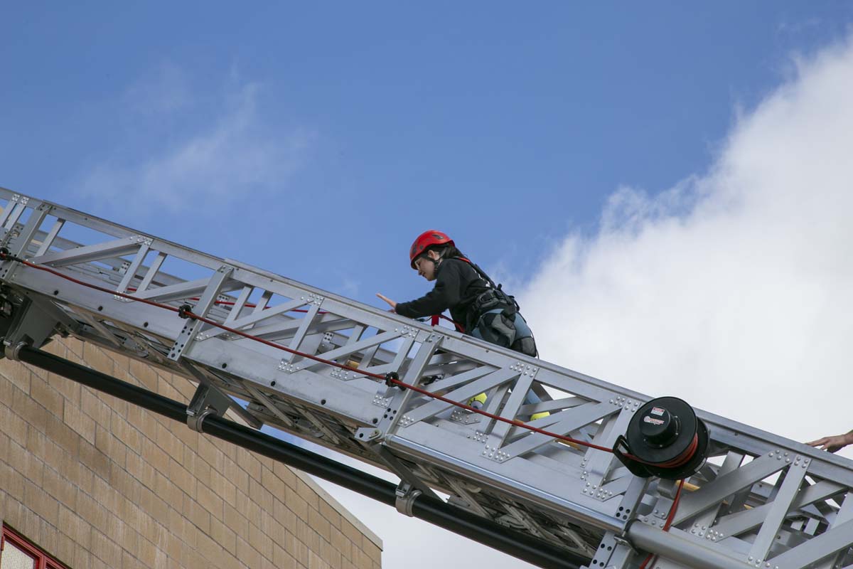 Girls attend the Empowerment Camp at Fire Academy.