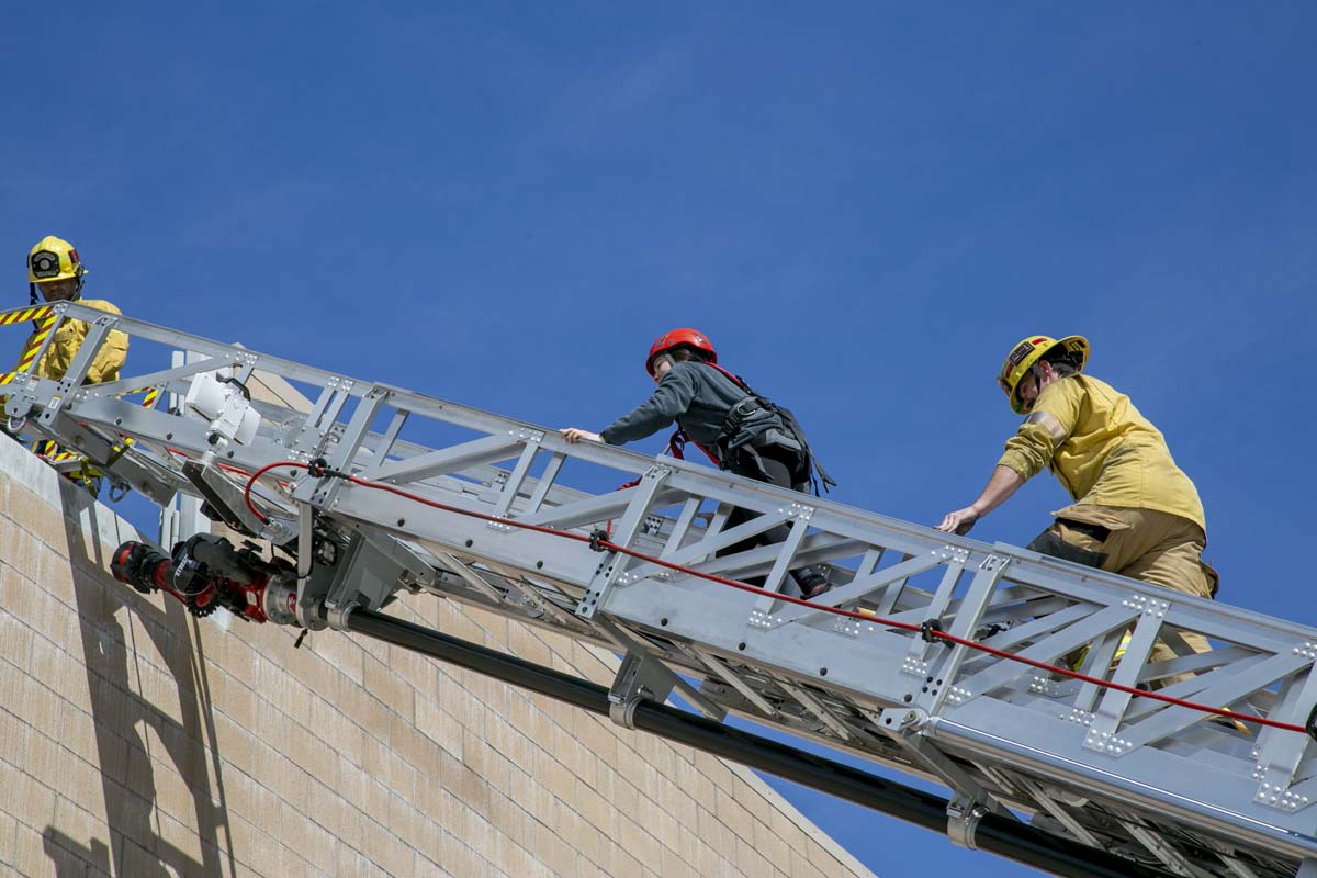 Girls attend the Empowerment Camp at Fire Academy.