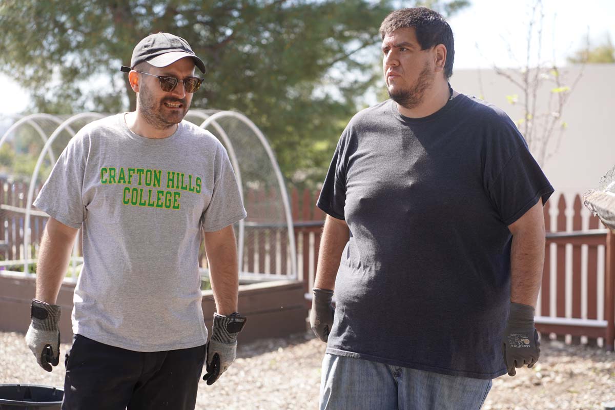 Students attend the planting party at the CHC garden.