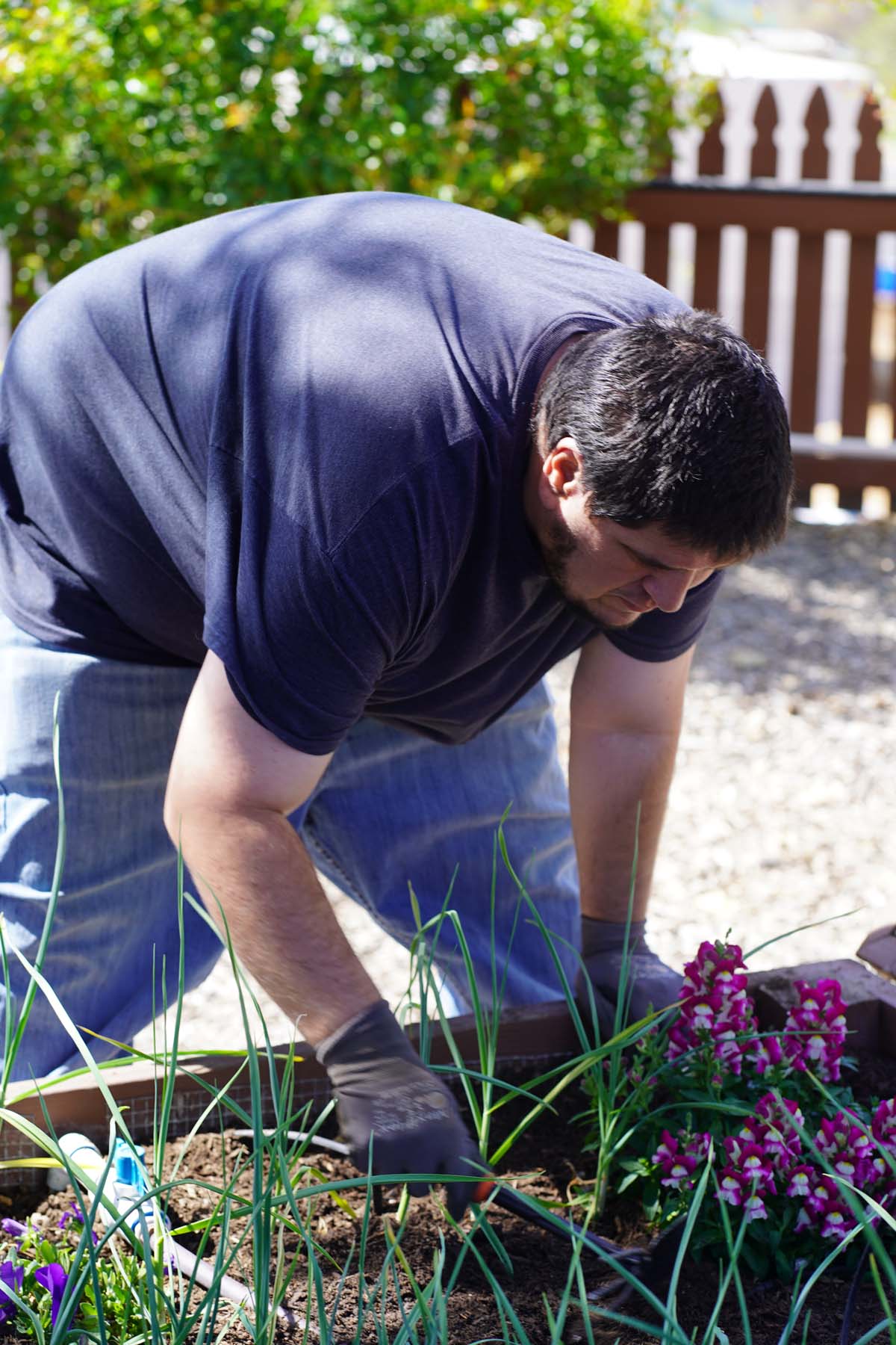 Students attend the planting party at the CHC garden.