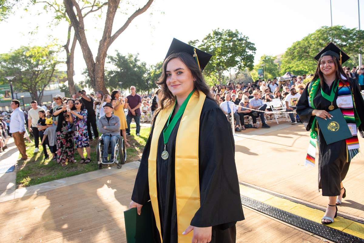 Students receive diploma covers at CHC Commencement 2025.