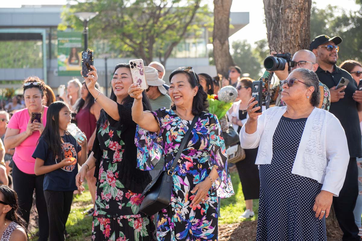 Students receive diploma covers at CHC Commencement 2025.