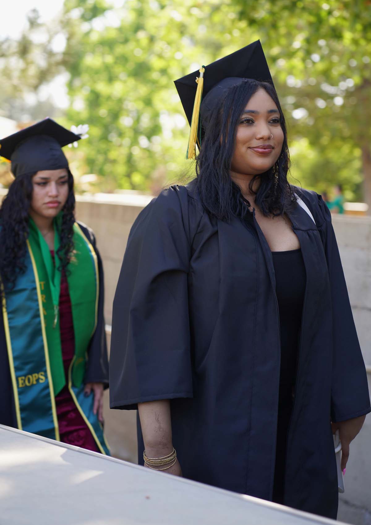 Students receive diploma covers at CHC Commencement 2025.