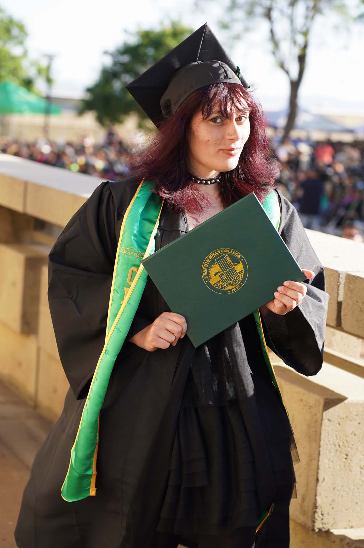 Students receive diploma covers at CHC Commencement 2025.