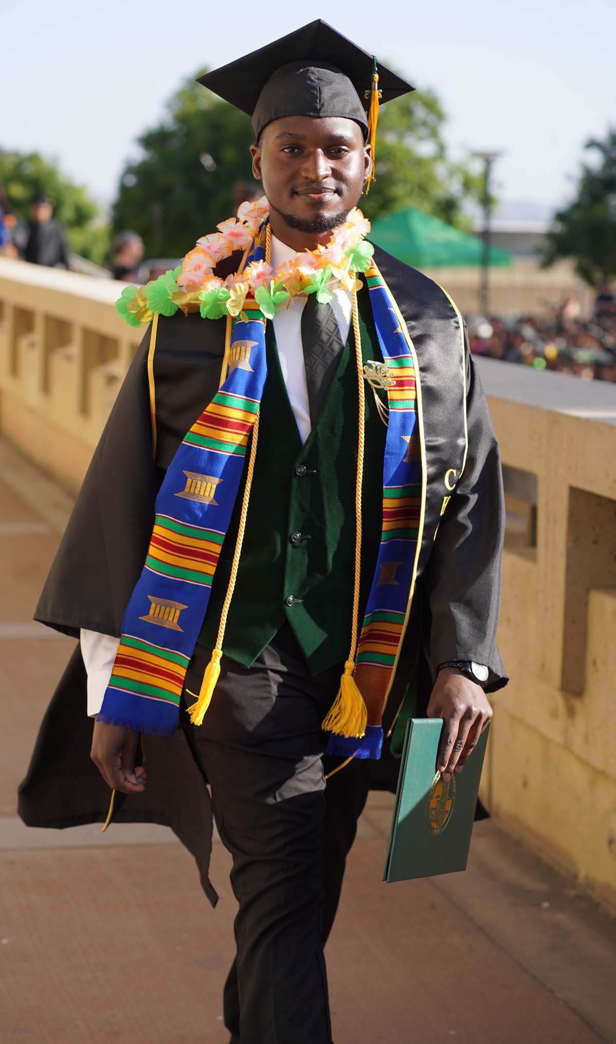 Students receive diploma covers at CHC Commencement 2025.
