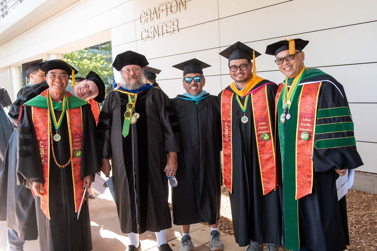 Faculty line up at CHC Commencement.