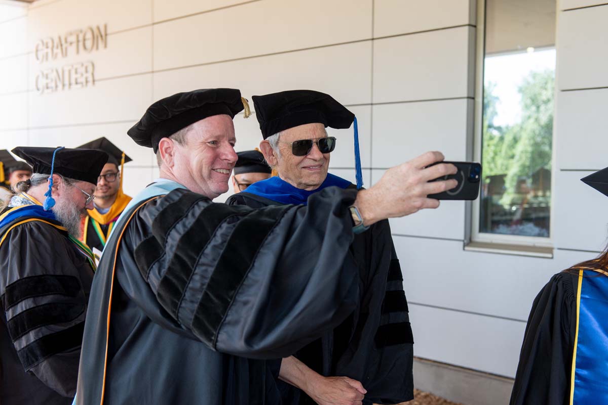 Faculty line up at CHC Commencement.