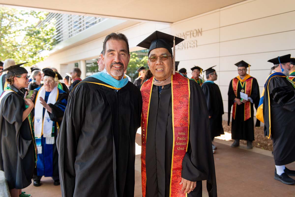 Faculty line up at CHC Commencement.