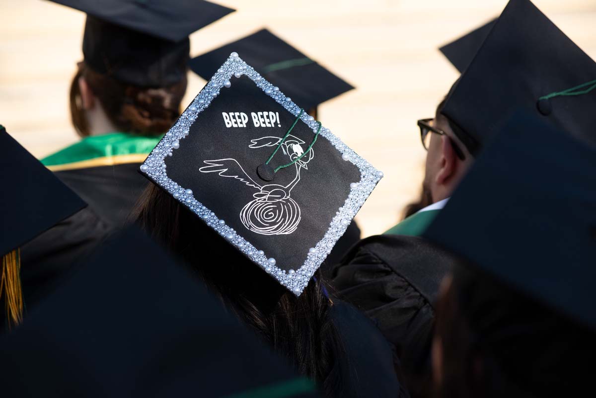 Grad caps from Commencement 2025.