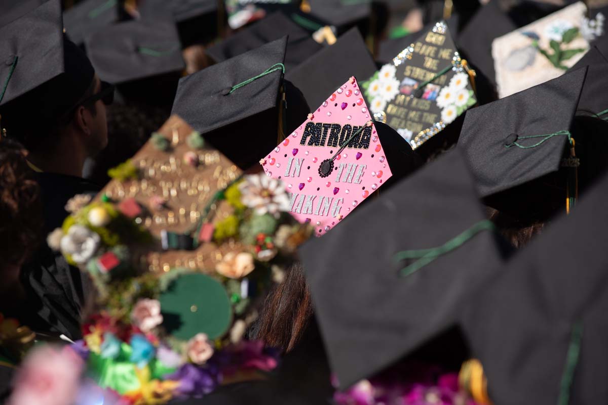 Grad caps from Commencement 2025.