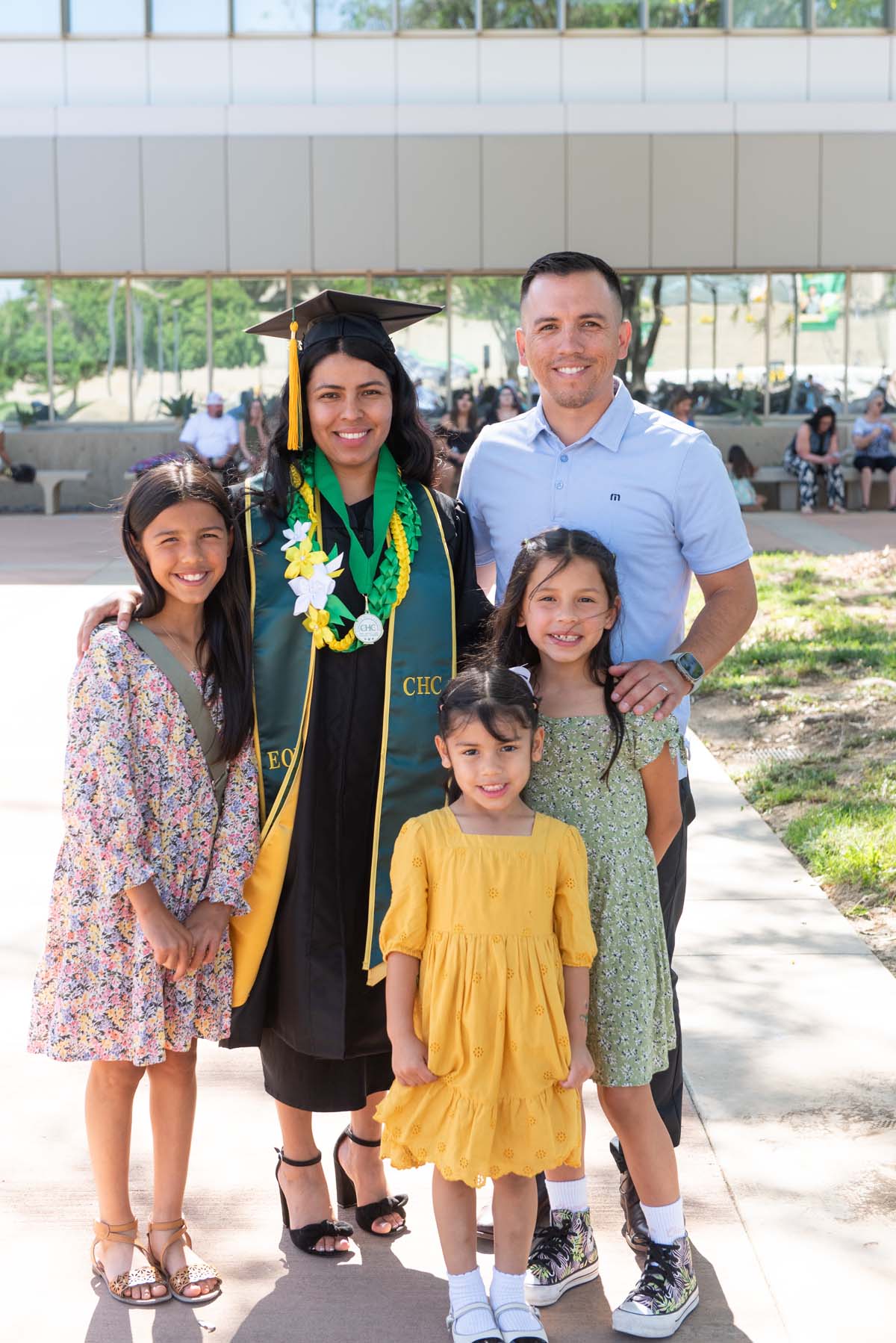 Grad recession at Commencement 2025 and pictures with family members.
