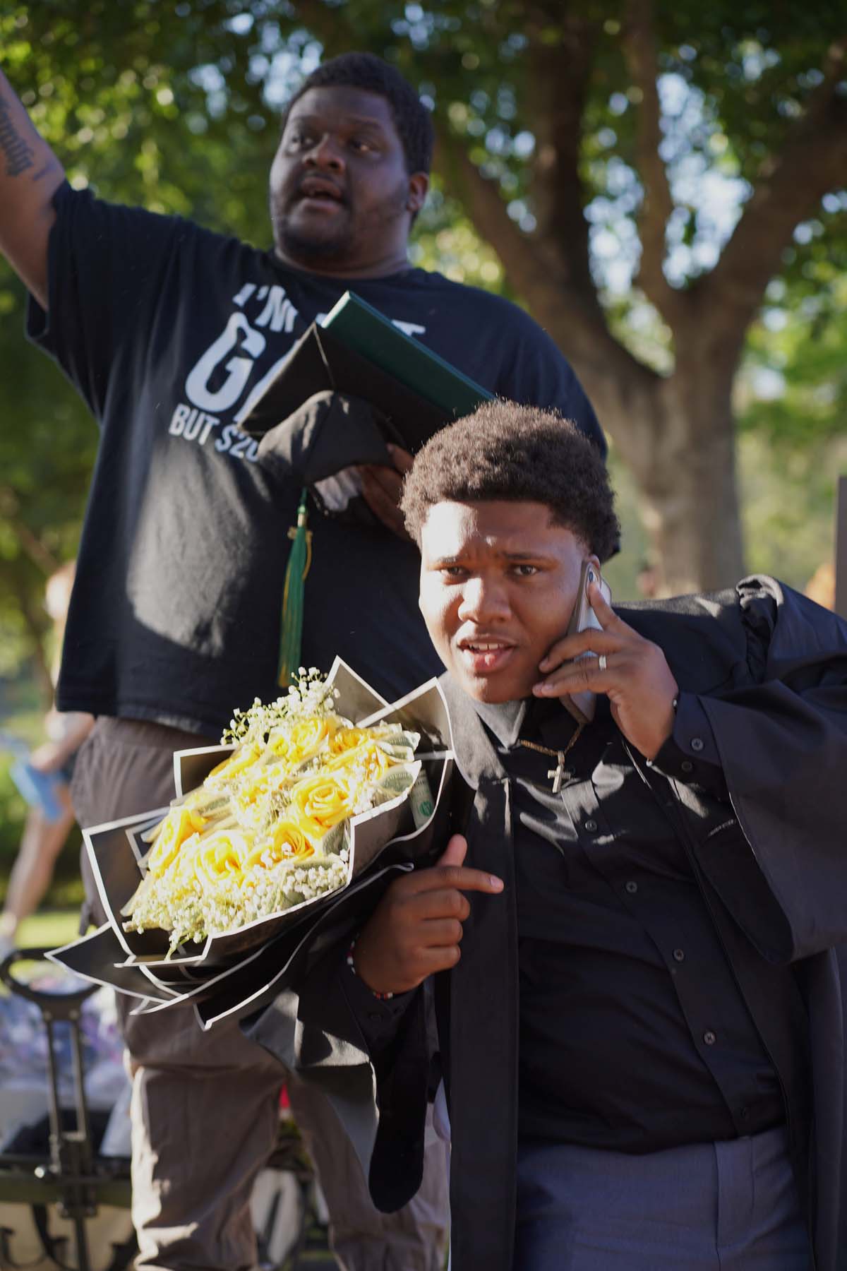 Grad recession at Commencement 2025 and pictures with family members.