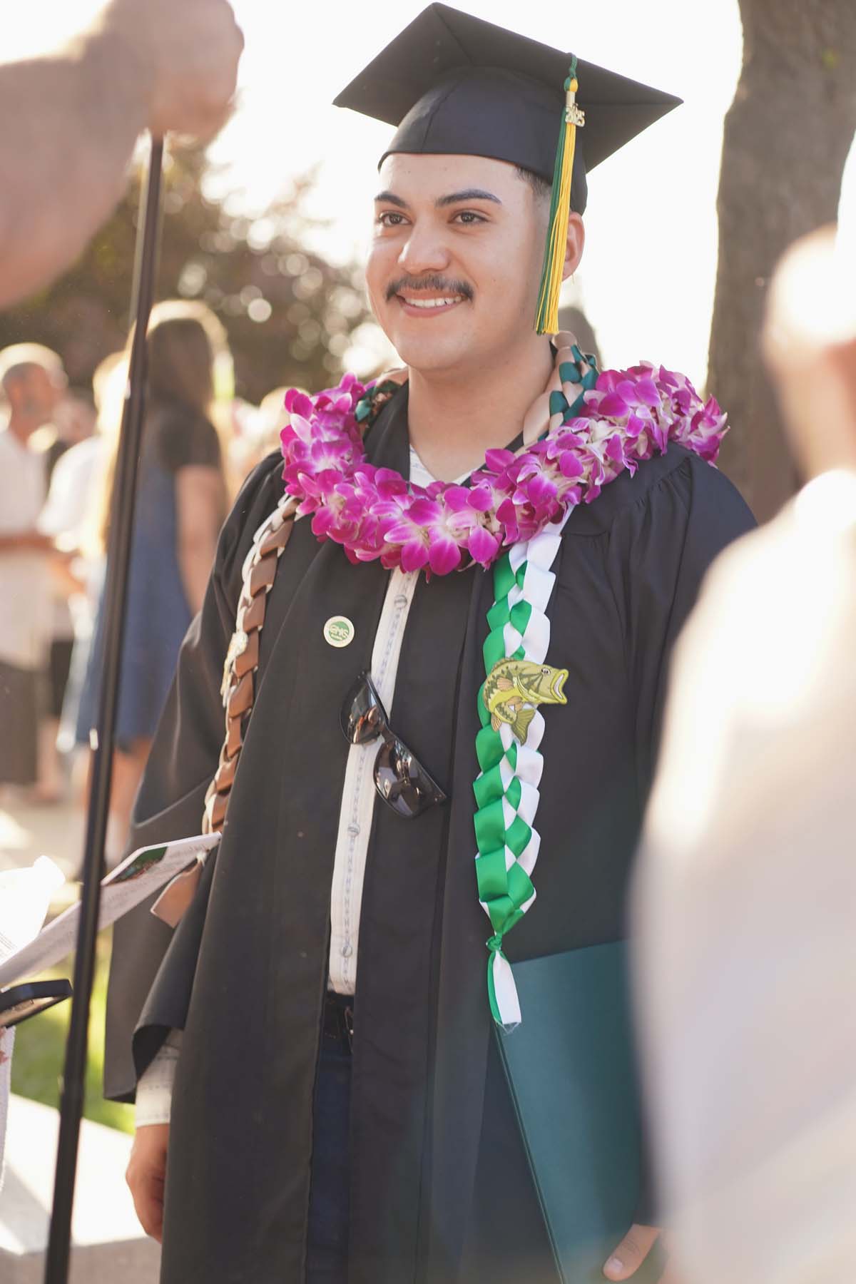 Grad recession at Commencement 2025 and pictures with family members.