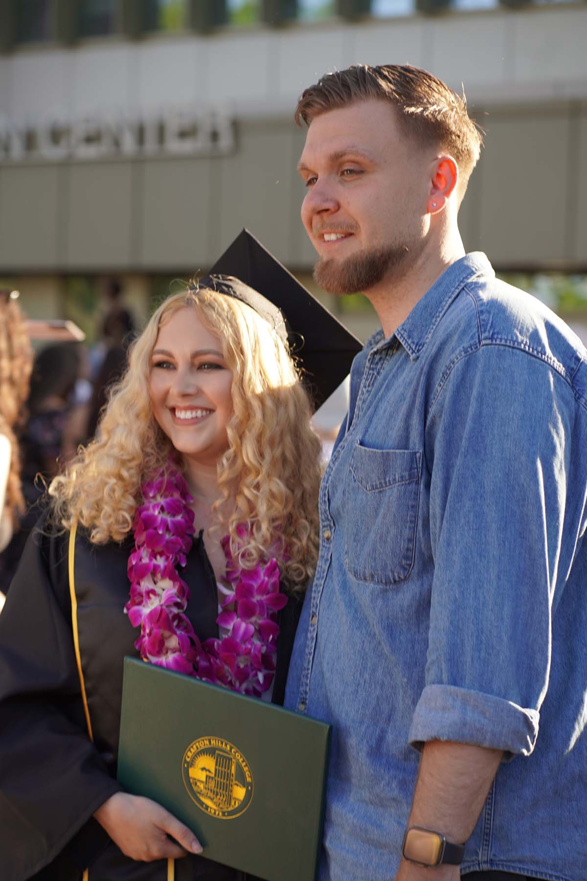 Grad recession at Commencement 2025 and pictures with family members.