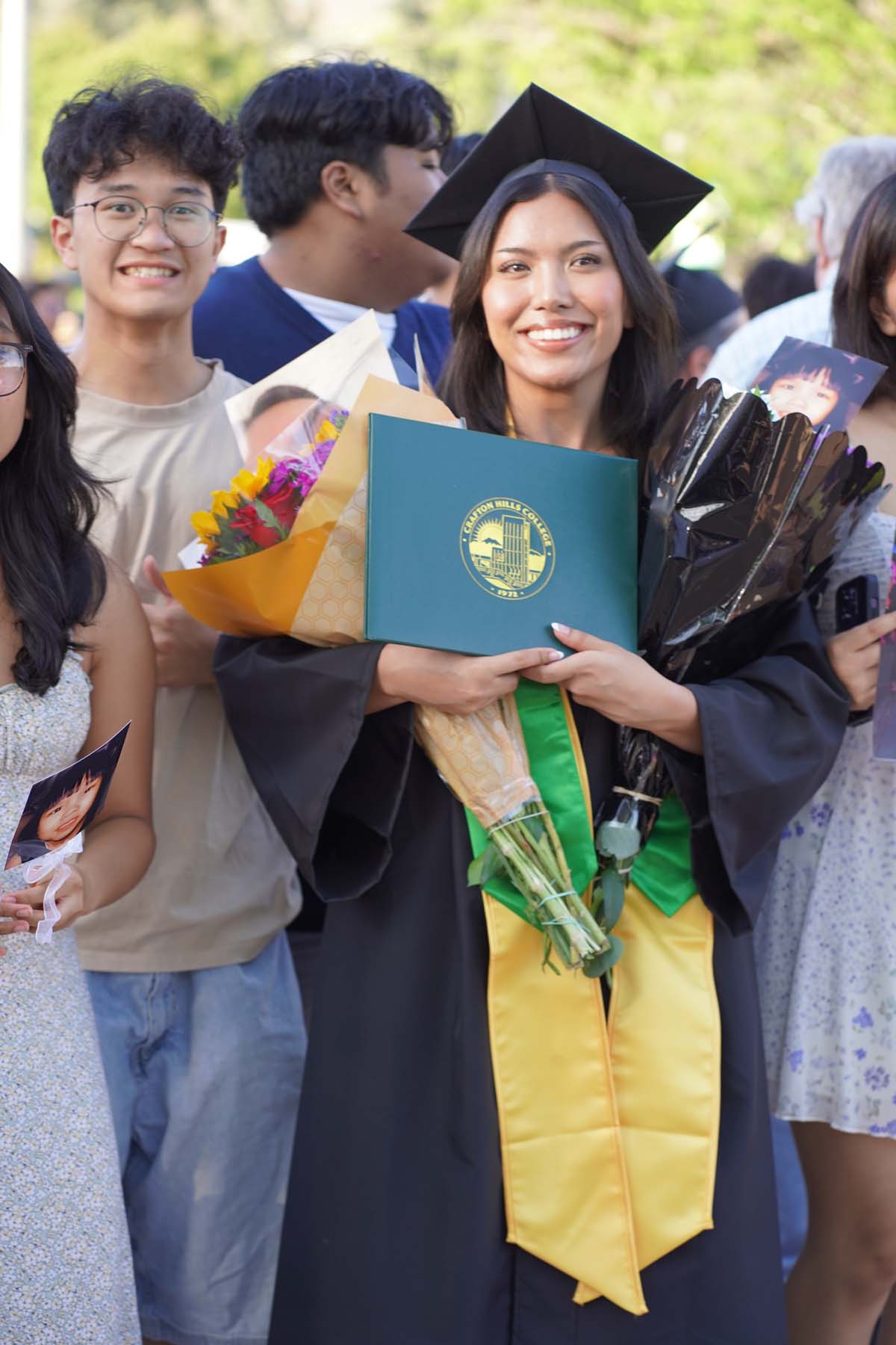 Grad recession at Commencement 2025 and pictures with family members.