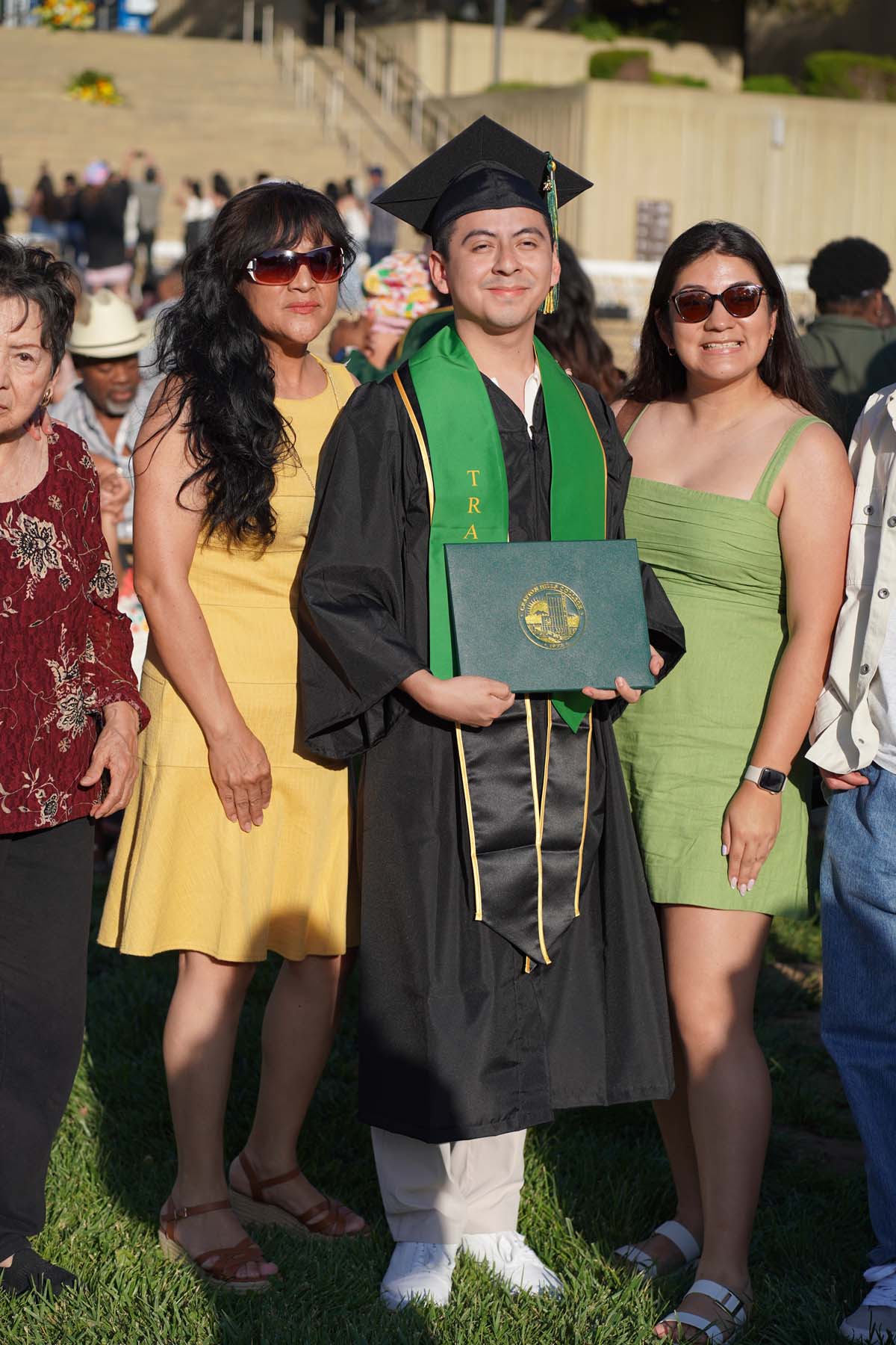 Grad recession at Commencement 2025 and pictures with family members.