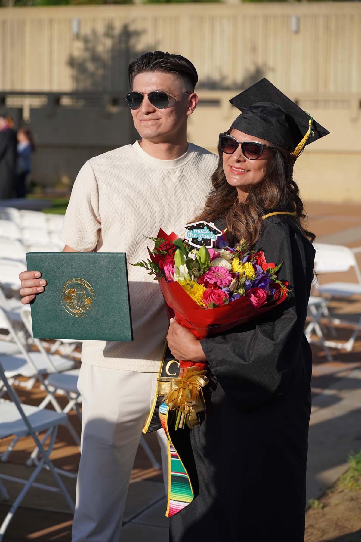 Grad recession at Commencement 2025 and pictures with family members.