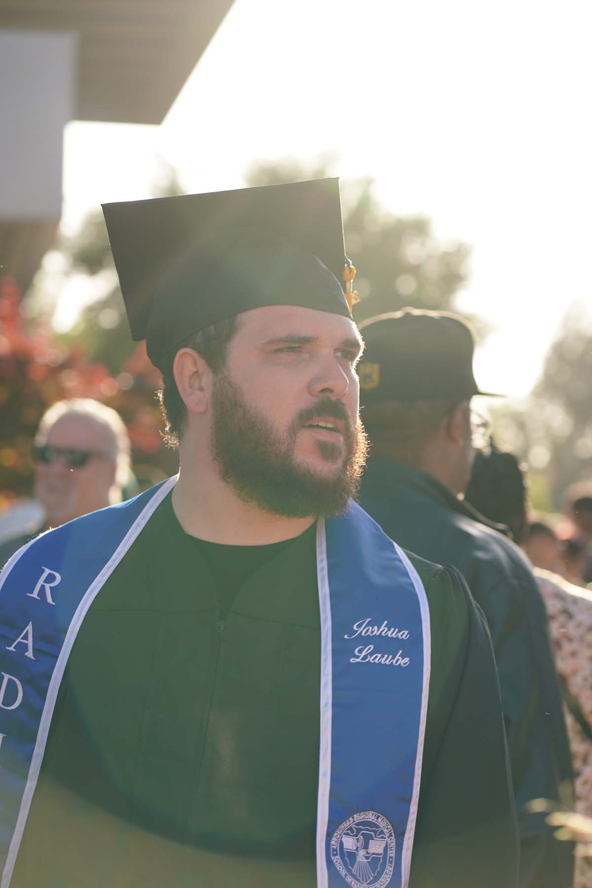 Grad recession at Commencement 2025 and pictures with family members.