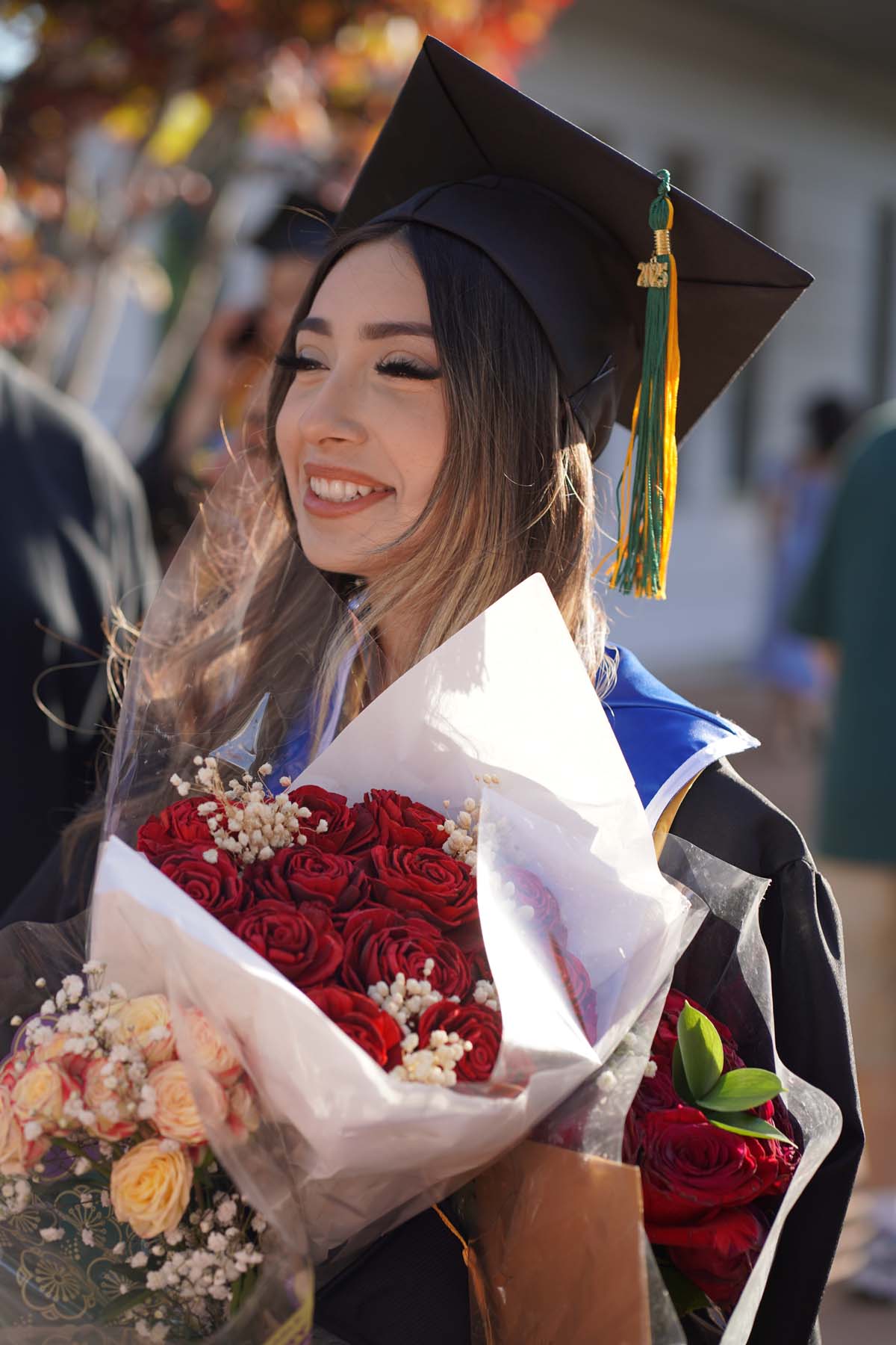 Grad recession at Commencement 2025 and pictures with family members.
