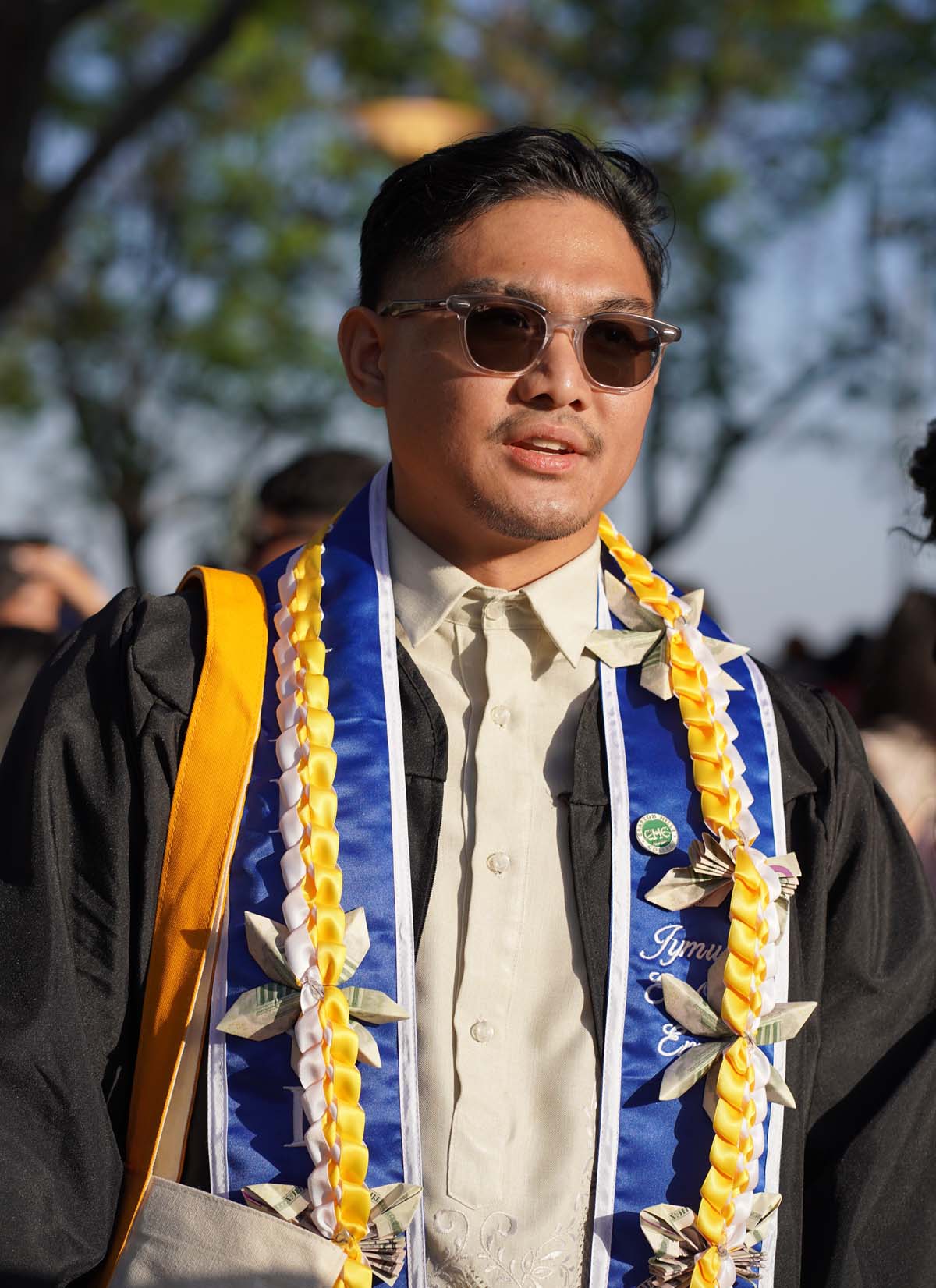 Grad recession at Commencement 2025 and pictures with family members.