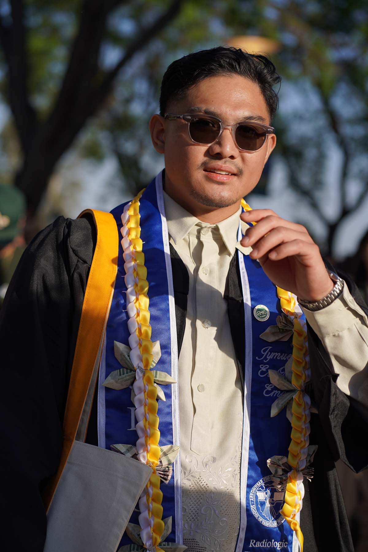 Grad recession at Commencement 2025 and pictures with family members.