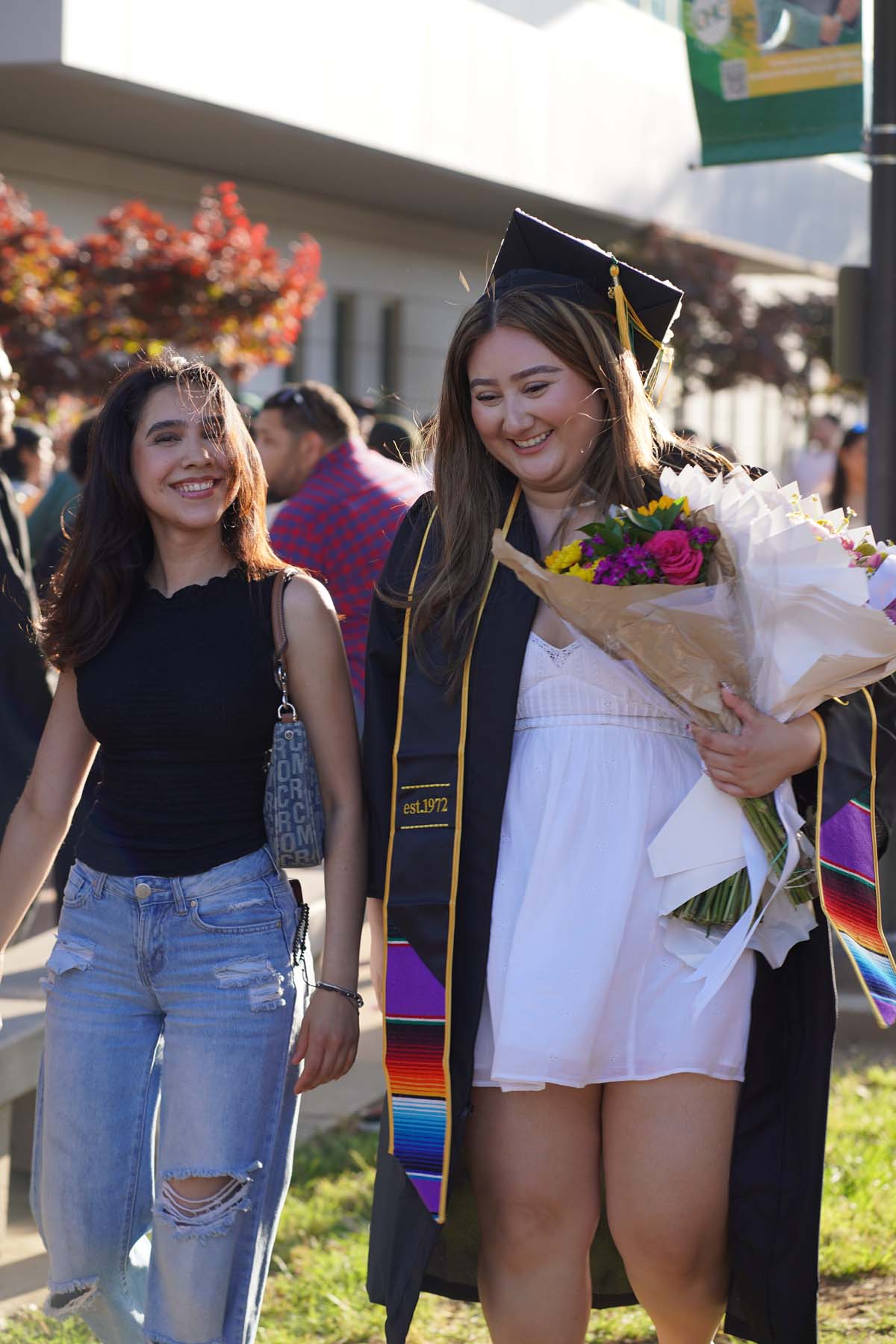 Grad recession at Commencement 2025 and pictures with family members.