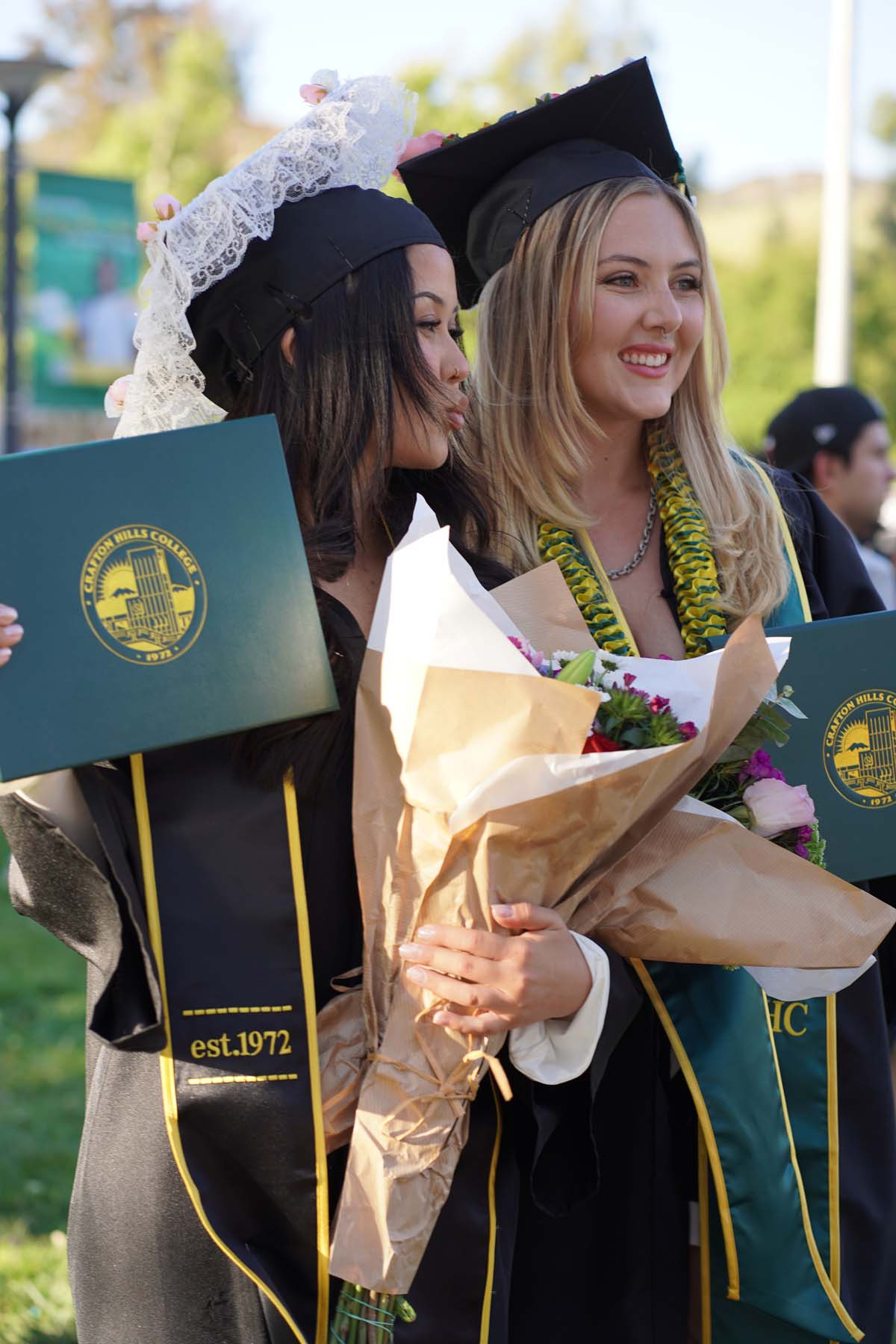 Grad recession at Commencement 2025 and pictures with family members.