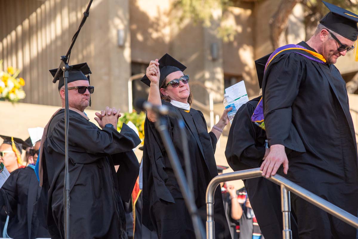 Grad recession at Commencement 2025 and pictures with family members.