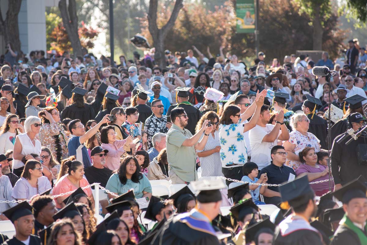 Grad recession at Commencement 2025 and pictures with family members.
