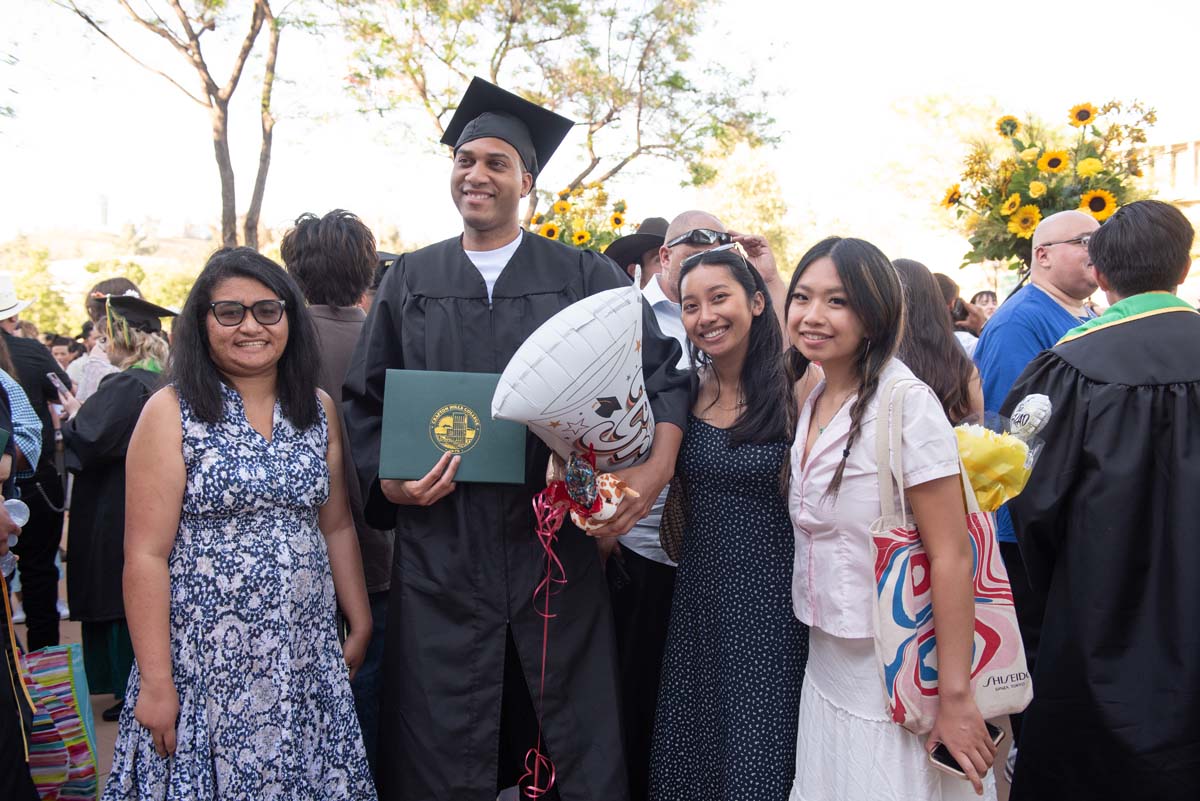 Grad recession at Commencement 2025 and pictures with family members.