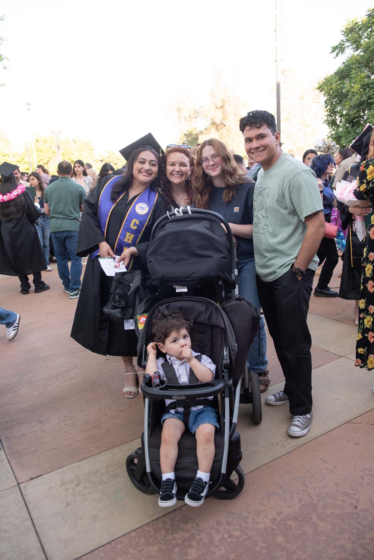 Grad recession at Commencement 2025 and pictures with family members.