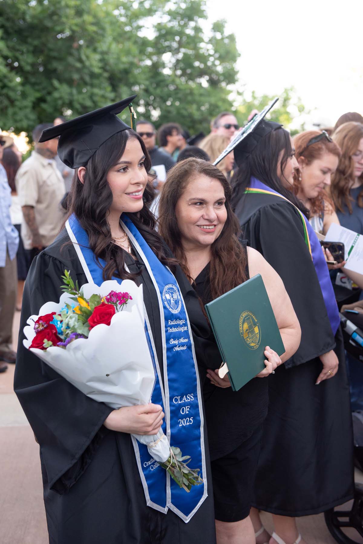 Grad recession at Commencement 2025 and pictures with family members.