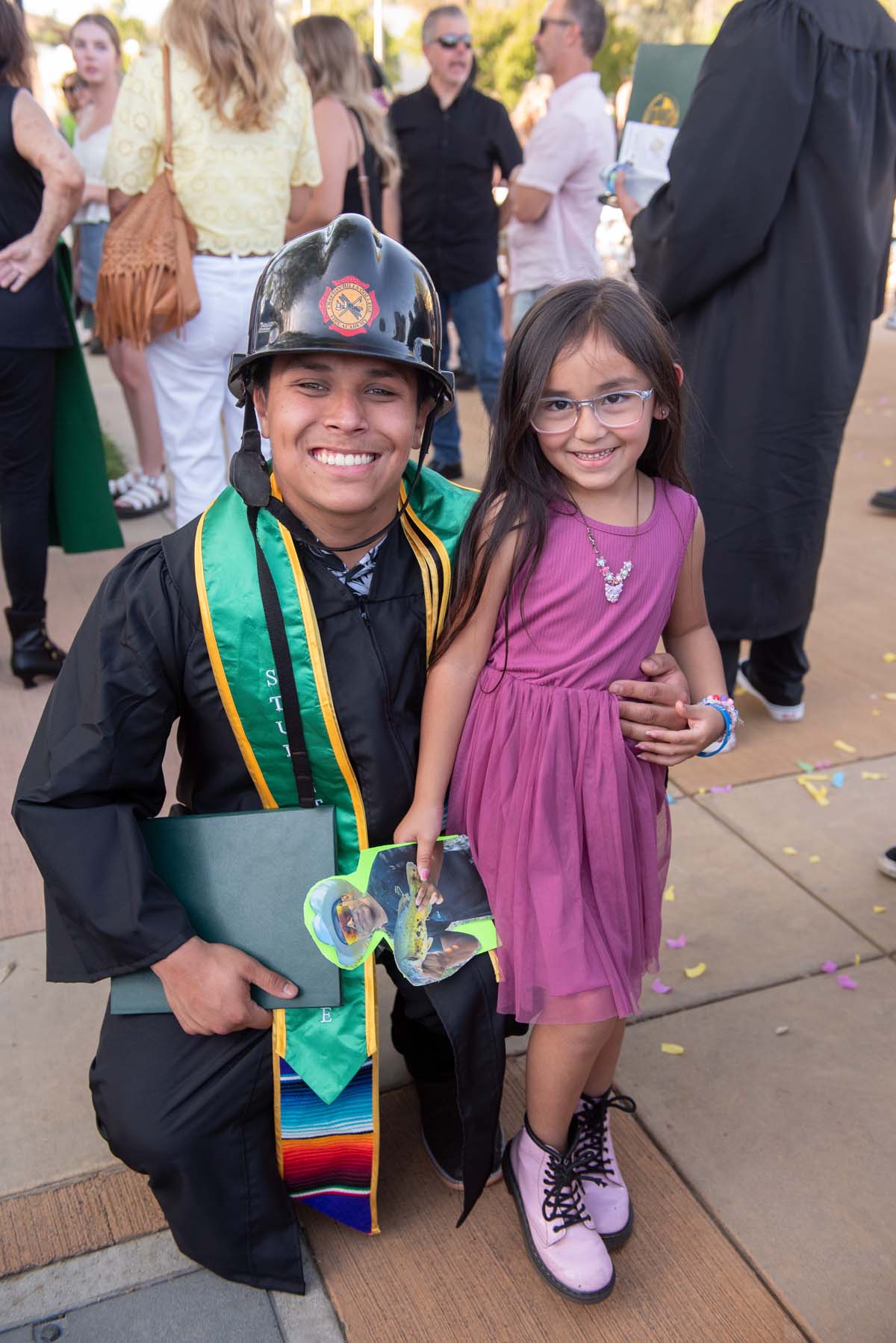 Grad recession at Commencement 2025 and pictures with family members.