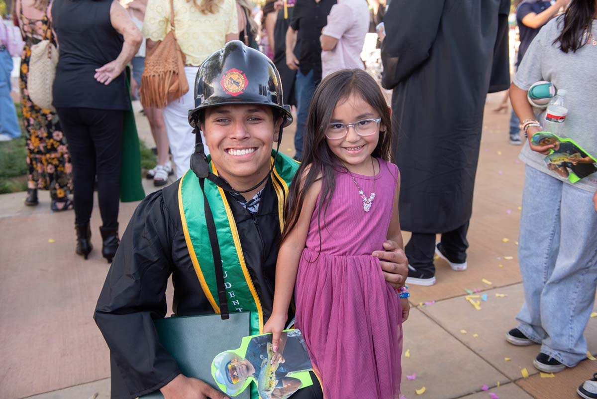 Grad recession at Commencement 2025 and pictures with family members.