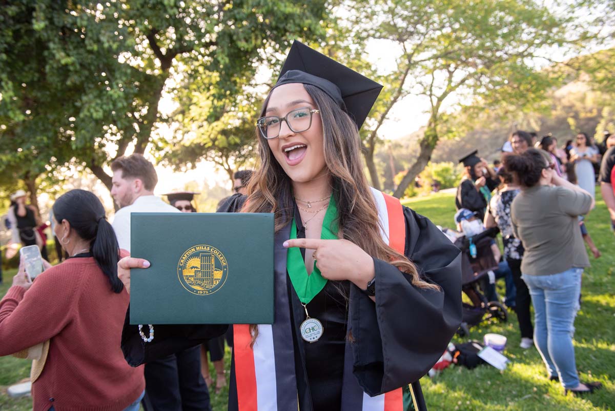 Grad recession at Commencement 2025 and pictures with family members.