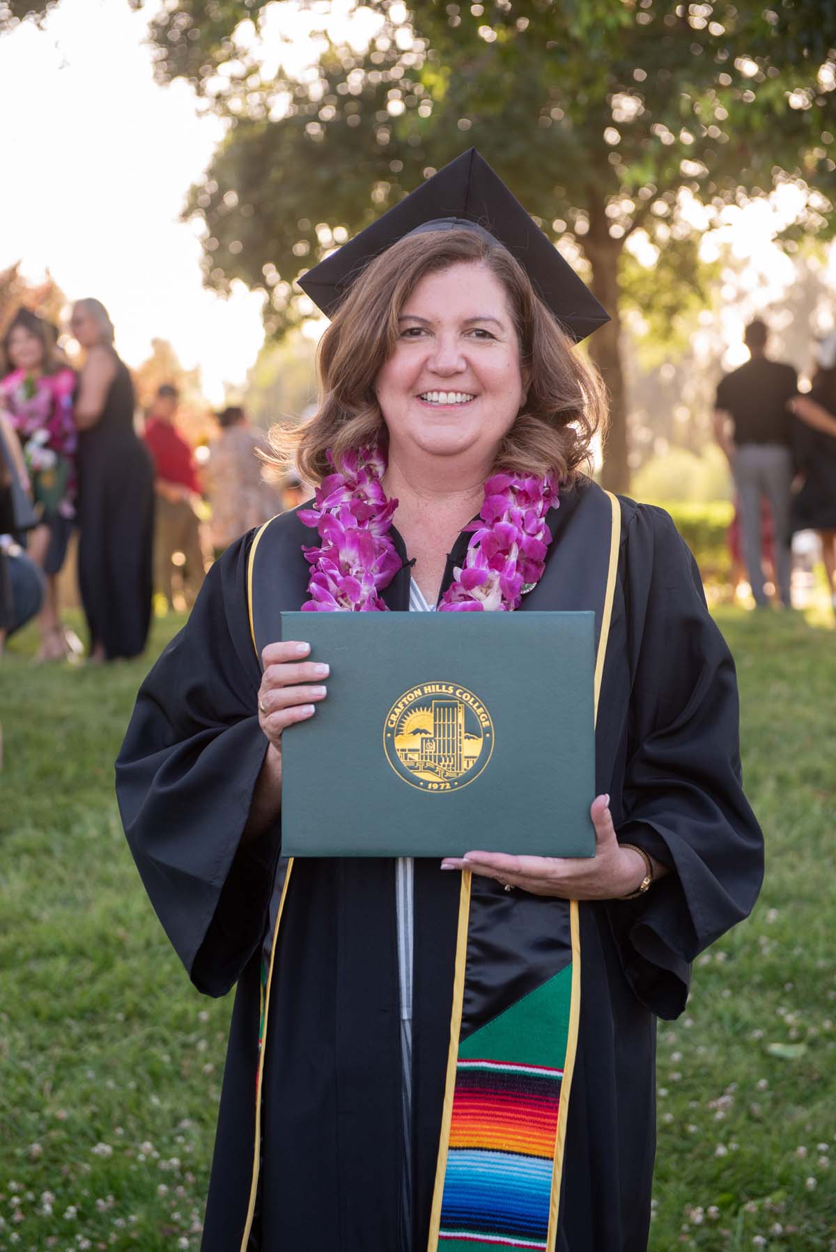 Grad recession at Commencement 2025 and pictures with family members.