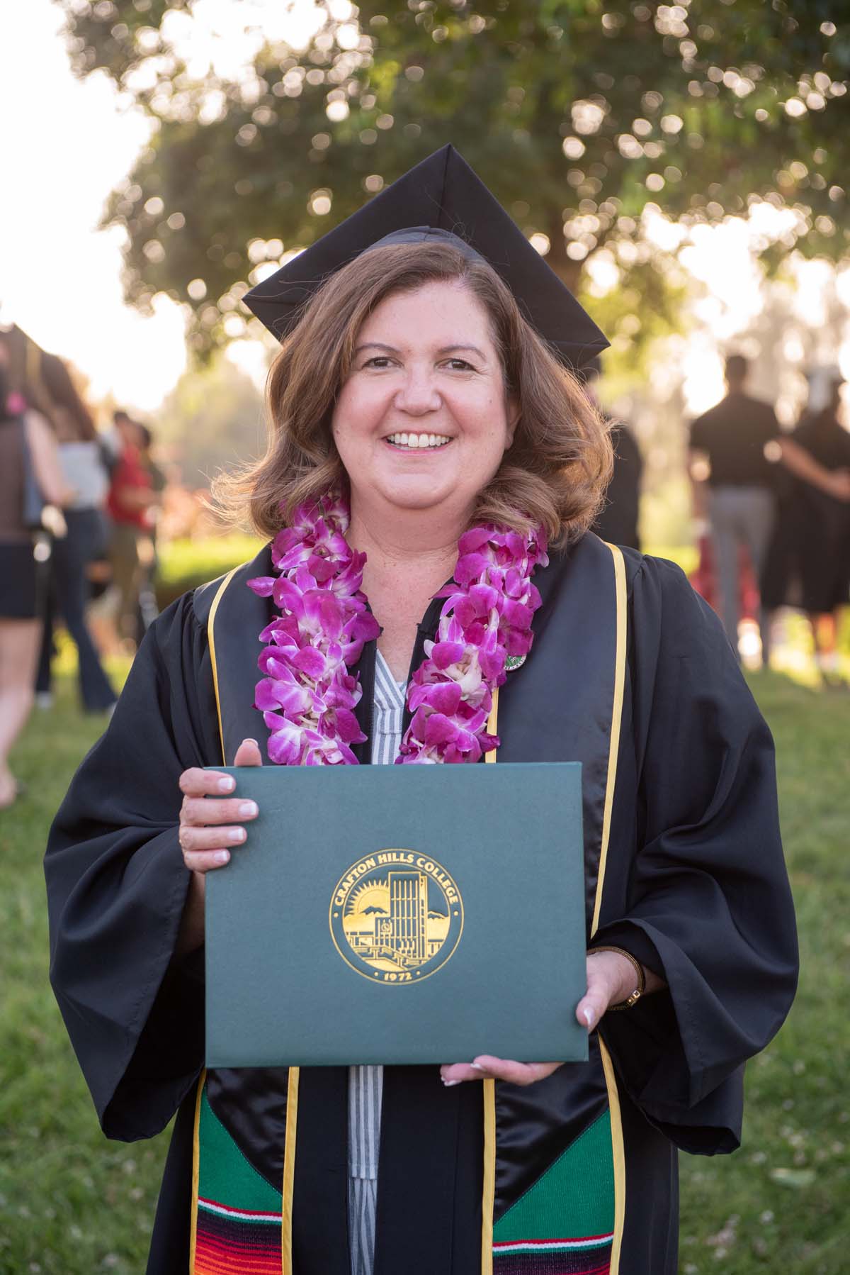 Grad recession at Commencement 2025 and pictures with family members.