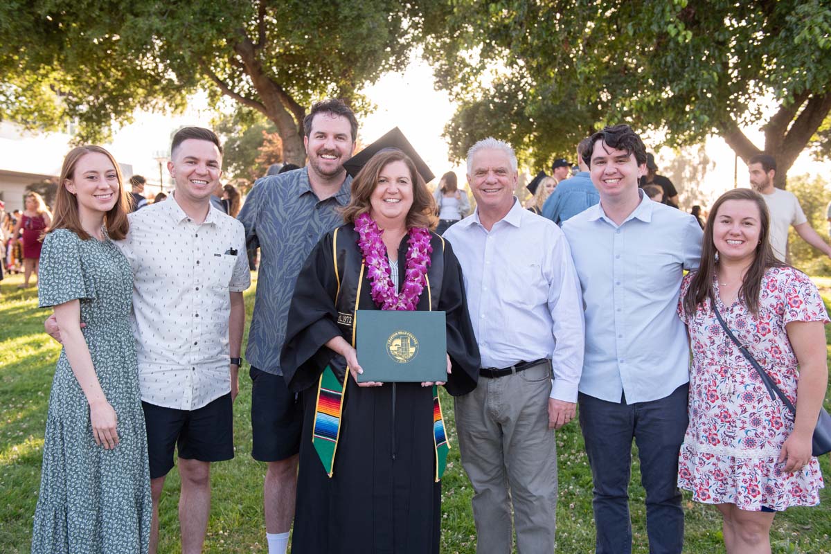 Grad recession at Commencement 2025 and pictures with family members.