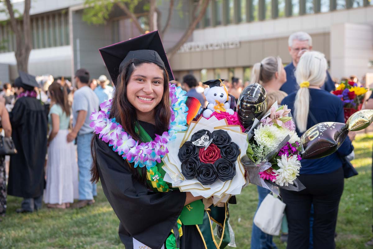 Grad recession at Commencement 2025 and pictures with family members.