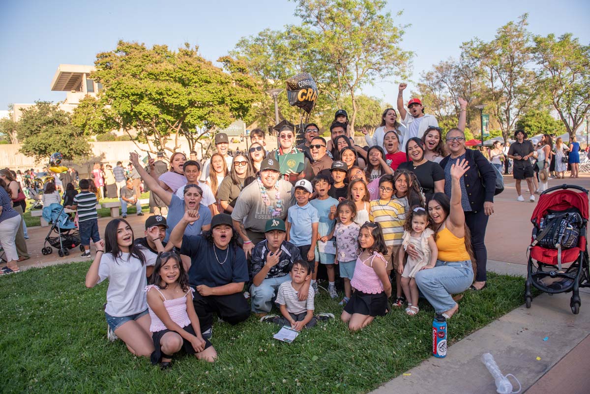 Grad recession at Commencement 2025 and pictures with family members.