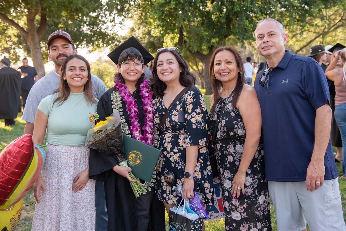 Grad recession at Commencement 2025 and pictures with family members.