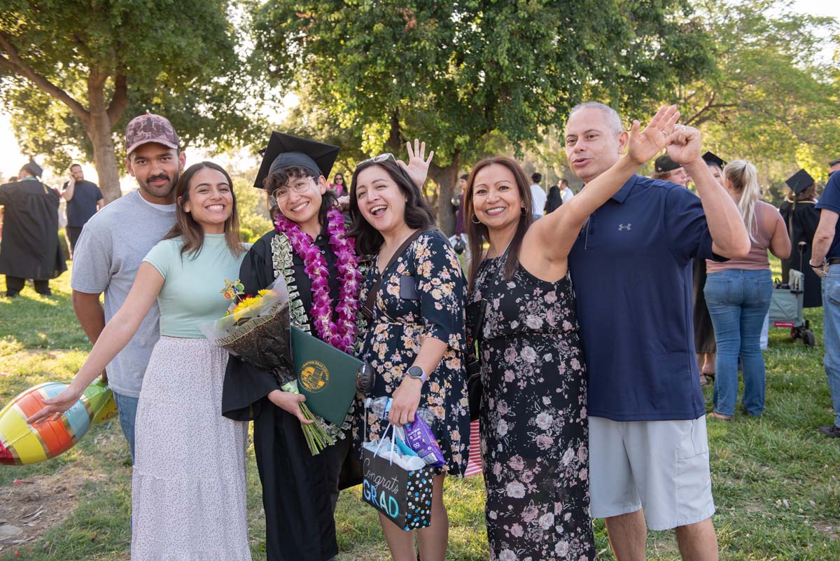 Grad recession at Commencement 2025 and pictures with family members.